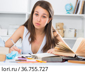 Woman is writing a review of novel. Стоковое фото, фотограф Яков Филимонов / Фотобанк Лори