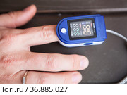 Close-up view at an oximeter for monitoring peripheral oxygen saturation. Стоковое фото, фотограф Кекяляйнен Андрей / Фотобанк Лори