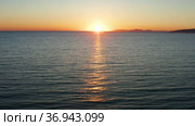 Закат на Чёрном море. Солнце садится в воду. Вид с воздуха. Sunset on the Black Sea. The sun sets in the water. Aerial view. Стоковое видео, видеограф Евгений Романов / Фотобанк Лори