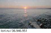 Закат на Черном море. Солнце садится в воду. Sunset on the Black Sea. The sun sets in the water. Стоковое видео, видеограф Евгений Романов / Фотобанк Лори
