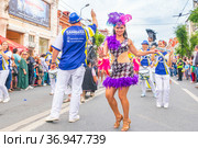 Russia, Samara, July 2019: processions of beautiful dressed up girls on Kuibyshev street at the carnival dedicated to the World Cup. Редакционное фото, фотограф Акиньшин Владимир / Фотобанк Лори