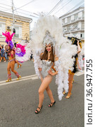 Russia, Samara, July 2019: processions of beautiful dressed up girls on Kuibyshev street at the carnival dedicated to the World Cup. Редакционное фото, фотограф Акиньшин Владимир / Фотобанк Лори
