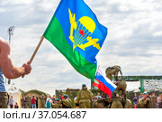 Russia, Samara, June 2019: Soldiers of paratroopers perform demonstration exercises for spectators of the race of heroes. Text in Russian: Declaration of an individual. Редакционное фото, фотограф Акиньшин Владимир / Фотобанк Лори