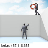 Businessman saving colleague with lifebuoy. Стоковое фото, фотограф Elnur / Фотобанк Лори