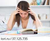 Woman is solving an equation. Стоковое фото, фотограф Яков Филимонов / Фотобанк Лори