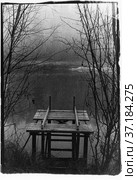 A broken small wooden pier on a forest lake. Стоковое фото, фотограф Александр Клёнов / Фотобанк Лори