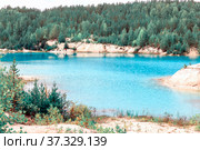 beautiful turquoise color of water in a kaolin quarry near the city of Kyshtym, Chelyabinsk region in Russia. Стоковое фото, фотограф Акиньшин Владимир / Фотобанк Лори