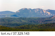panorama of the Ural mountains of the Taganai ridge of the Chelyabinsk region view from the Aleksandrovskaya Sopka on a sunny summer day. Стоковое фото, фотограф Акиньшин Владимир / Фотобанк Лори