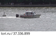 MOSCOW - JULE 25: Boat EMERCOM of Russia floating on the Moscow river on Jule 25, 2019 in Moscow, Russia. Стоковое фото, фотограф Фотограф / Фотобанк Лори