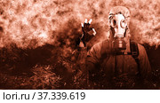 A shot of a man dressed in a gas mask, a hooded jacket, a backpack, shows a gesture of ok, looks into the camera. Poster on the background of grunge. Стоковое фото, фотограф Владимир Арсентьев / Фотобанк Лори