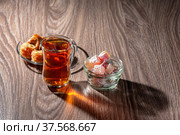 Turkish tea and sweets on a wooden table. Стоковое фото, фотограф Андрей Никитин / Фотобанк Лори