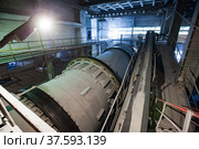 Grey factory mill in factory workshop of phosphoric fertilizers plant. Panorama view. No people. Стоковое фото, фотограф Alexey Rezvykh / Фотобанк Лори