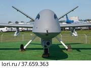 Китайский ударный высотный военный БПЛА Wing Loong II на Международном авиационном салоне МАКС-2019, вид спереди. Редакционное фото, фотограф Малышев Андрей / Фотобанк Лори