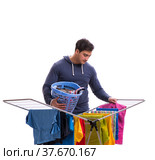 Husband man doing laundry isolated on white. Стоковое фото, фотограф Elnur / Фотобанк Лори