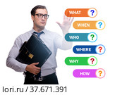 Concept of many different questions asked with businessman. Стоковое фото, фотограф Elnur / Фотобанк Лори