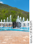 Fountain in the form of mugs in the resort park in Zheleznovodsk, Stavropol Territory, Russia - May 1, 2021. Редакционное фото, фотограф Наталия Попова / Фотобанк Лори