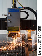 Modern laser precision CNC cutting machine. (2012 год). Редакционное фото, фотограф Alexey Rezvykh / Фотобанк Лори