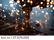 Modern laser precision CNC cutting machine. Стоковое фото, фотограф Alexey Rezvykh / Фотобанк Лори