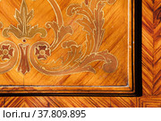 Decorative inlay carving of vintage wooden wall panel. Стоковое фото, фотограф EugeneSergeev / Фотобанк Лори