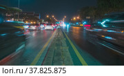 Hyperlapse of night city traffic on street intersection. Timelapse of cars and motorbikes movement. (2018 год). Редакционное видео, видеограф Александр Маркин / Фотобанк Лори
