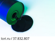 Black oil barrel with oil drop on white background. Стоковое фото, фотограф Сергей Толмачёв / Фотобанк Лори