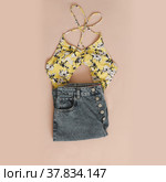 Summer fashion, vacation on sea concept. Swimwear and denim shorts top view flatlay. Стоковое фото, фотограф Galina kondratenko / Фотобанк Лори