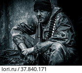Солдат после боя. Вооружённый доброволец. Наёмник в военном снаряжении. (2021 год). Редакционное фото, фотограф Виталий Михайлюк / Фотобанк Лори