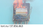 Electrical fire after short circuit in faulty electrical wiring. Стоковое видео, видеограф Владимир Григорьев / Фотобанк Лори