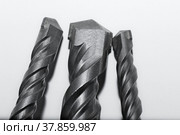 Drill bits for perforator close-up on a white background. Стоковое фото, фотограф Сергей Бадалов / Фотобанк Лори