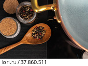 Copper pot with boiling water on a gas stove. Стоковое фото, фотограф Сергей Толмачёв / Фотобанк Лори