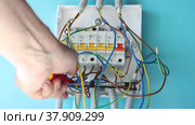 Service for consumer unit with fuse box and circuit breakers for home wiring. Стоковое видео, видеограф Владимир Григорьев / Фотобанк Лори