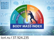Concept of BMI - body mass index with man. Стоковое фото, фотограф Elnur / Фотобанк Лори