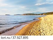 Lake Baikal. The beautiful sandy beach of the Saraiskiy Bay is a favorite vacation spot for tourists on Olkhon Island. Summer travel. Natural background. Стоковое фото, фотограф Виктория Катьянова / Фотобанк Лори