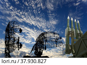 Air defense radars of military mobile anti aircraft systems and modern Russian anti aircraft missiles OSA-AKM on background clouds and sky,Russia. Стоковое фото, фотограф Владимир Журавлев / Фотобанк Лори