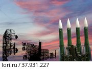 Air defense radars of military mobile anti aircraft systems and modern Russian anti-aircraft missiles OSA-AKM on the background of the sunset orange sky,Russia. Стоковое фото, фотограф Владимир Журавлев / Фотобанк Лори