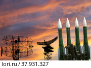 Air defense radars of military mobile anti aircraft systems and modern Russian anti-aircraft missiles OSA-AKM on the background of the sunset orange sky,Russia. Стоковое фото, фотограф Владимир Журавлев / Фотобанк Лори