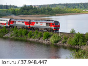 Туристический поезд на дамбе. Карелия (2022 год). Редакционное фото, фотограф Анна Карасева / Фотобанк Лори