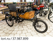 Wheelchair Westfalia, it was produced at the Voltman plant in Germany in 1915-1924. The Museum of Technology of Vadim Zadorozhny. Moscow region, Russia (2020 год). Редакционное фото, фотограф Наталья Волкова / Фотобанк Лори