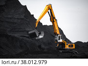coal mining pile vehicle port. Стоковое фото, фотограф Mark Agnor / Фотобанк Лори