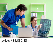 Woman and man doctors radiologists working at the clinic. Стоковое фото, фотограф Elnur / Фотобанк Лори