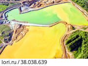 Gold mining. Flushing the rock with an old dredge. View from above. Environmental pollution. Стоковое фото, фотограф Евгений Ткачёв / Фотобанк Лори
