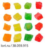 Set of colored pieces of candied fruits isolated on white background. fruit in sugar syrup. Стоковое фото, фотограф Поликарпов Владимир Владимирович / Фотобанк Лори
