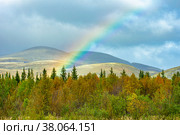Радуга над осенним лесом на фоне Хибинских гор. Стоковое фото, фотограф Анна Аникова / Фотобанк Лори
