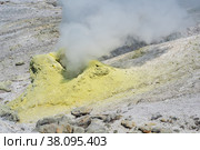 Steaminf fumarola in a solfataric field on a slope of the volcano. Стоковое фото, фотограф Евгений Харитонов / Фотобанк Лори