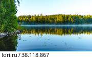 Morning landscape with a lake covered with haze. Saimaa lake system, Savo, Finland. Стоковое фото, фотограф Михаил Аккуратoв / Фотобанк Лори
