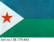 Национальный флаг Республика Джибути на тканевой основе крупным планом (2019 год). Стоковое фото, фотограф Лозовая Людмила / Фотобанк Лори
