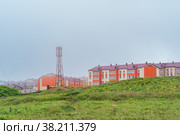 View of the town of Yuzhno-Kurilsk on the island of Kunashir. Стоковое фото, фотограф Евгений Харитонов / Фотобанк Лори