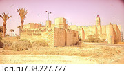 Monastir in Tunisia an ancient city and popular tourist destination on Mediterranean Sea. Traditional Arabic architecture in an urban landscape. Стоковая иллюстрация, иллюстратор Aleksandr Golubev / Фотобанк Лори