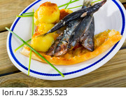 Roasted pilchards with potato balls and focaccia. Стоковое фото, фотограф Яков Филимонов / Фотобанк Лори