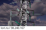 Electricity pylon (high voltage power line) on the background of the cloudy sky (time lapse) Стоковое видео, видеограф Владимир Журавлев / Фотобанк Лори